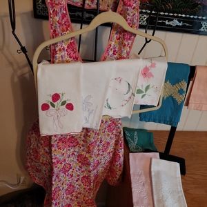 Vintage 1950s apron and 8 embroidered tea towels.